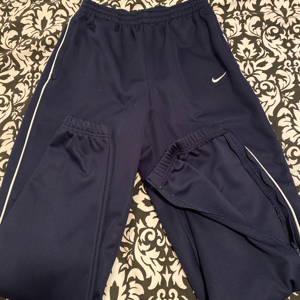 Nike sweatpants with leg zipper